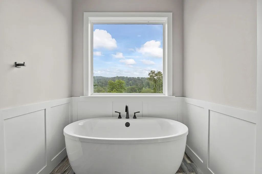 Freestanding soaking tub with a view